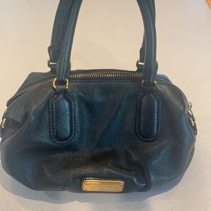 Slightly used Marc Jacobs bag w shoulder strap and original cover.